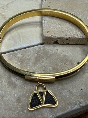 Gold-Plated Bangle Bracelet with Black Leather Charm